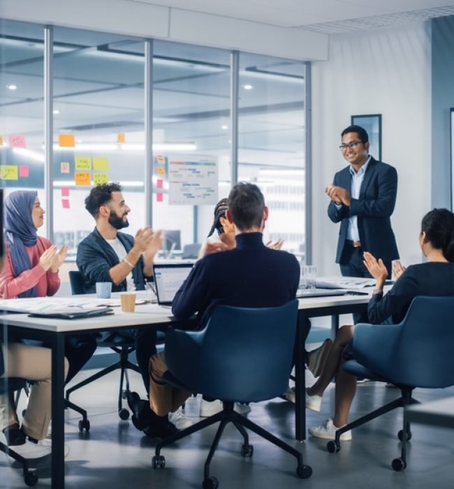 Multi-ethnic,Office,Conference,Room.,Indian,Ceo,Does,Presentation,For,Diverse